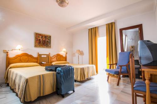 Abades Loja The 3-star Abades Loja offers comfort and convenience whether youre on business or holiday in Loja. Offering a variety of facilities and services, the hotel provides all you need for a good nights s