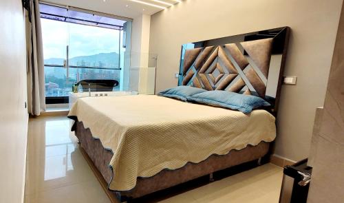Cerca al barrio Laureles con jacuzzi privado