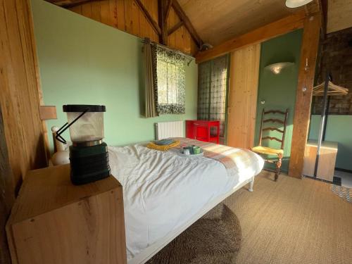 Jolie cabane avec jacuzzi pour les amoureux de la nature