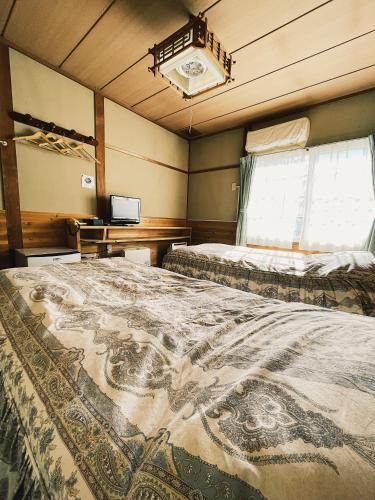 Hakuba Pension & Log Hotel Meteor