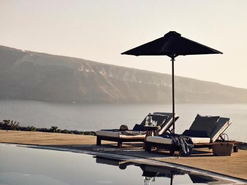 Villa Ilios con piscina y vistas al atardecer y al mar