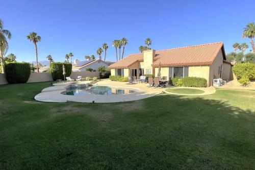 NEW Desert Oasis!! 3 Bedrooms, 1 Studio, 2 1/2 Bathrooms, Pool, Spa and Gorgeous backyard!!