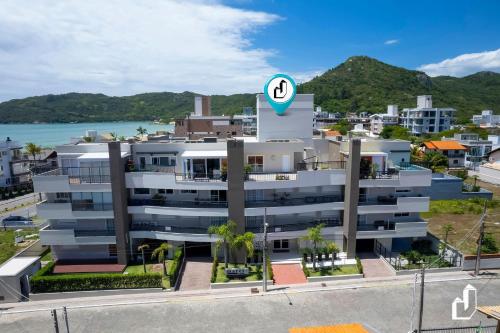 ทัศนียภาพภายนอกโรงแรม, Apartamento com 03 dormitórios meia quadra do mar (Apartamento com 03 dormitorios meia quadra do mar) in มอร์รินโยส