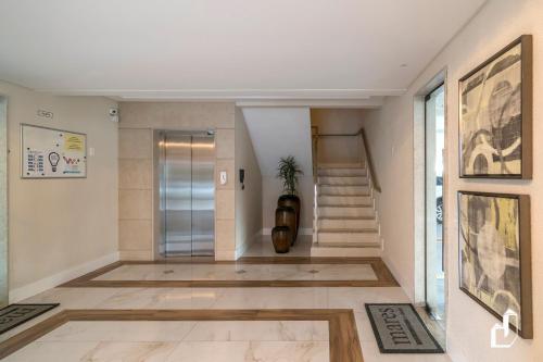 ล็อบบี้, Apartamento com 03 dormitórios meia quadra do mar (Apartamento com 03 dormitorios meia quadra do mar) in มอร์รินโยส