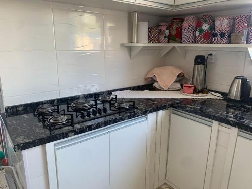 Kitchen, Casa Familia: Praia, Campeche e Conforto in Morro das Pedras