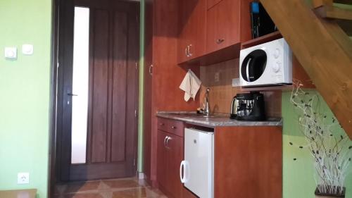 keuken, Nefelejcs Apartman in Ovaros