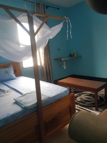Cozy Master bedroom with Free Wi-Fi in Tanga in Tanga