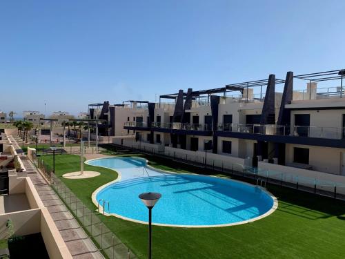 Higuericas Costa 223 - Planta baja soleada en residencial con 2 piscinas