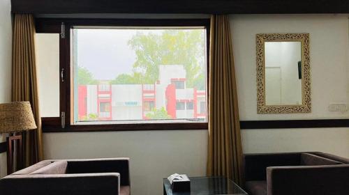 Hotel Whistling Greens in Moga