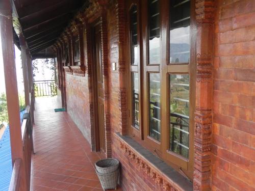 Erkély/terasz, Rupa View Guest house in Lakhnath