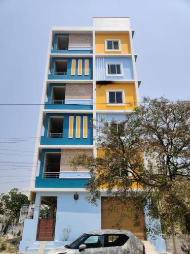 RAK Homestay - Luxury AC 2BHK Apartments for family stay - Walkable to PS4 restaurants -Equipped Kit - Tirupati