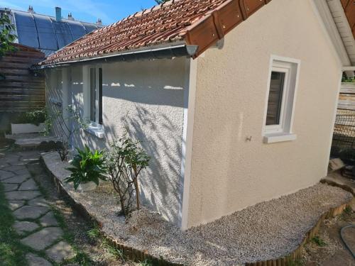 Petite maison cosy dans un jardin. - Location saisonnière - Ermont