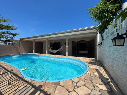 Casa com piscina Praia de Leste