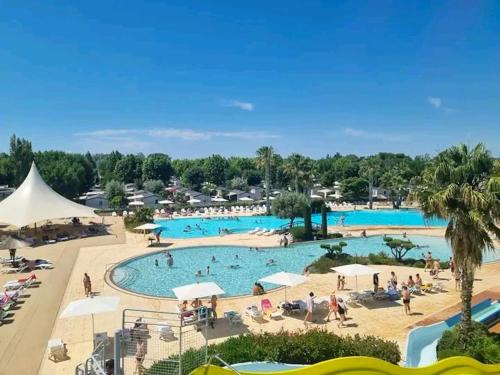 Bungalow de 3 chambres avec piscine partagee et terrasse a Vias a 1 km de la plage - Location saisonnière - Vias