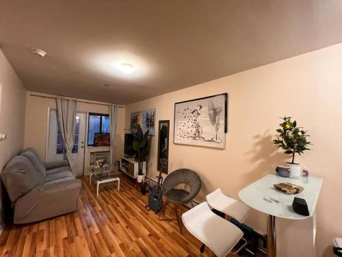 15 minutes to Manhattan with Balcony. Train is walking distance