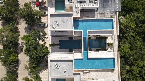 2BR with Fast WiFi FREE BIKES, Rooftop, Pool, and Gym, Тулум (фото 2)