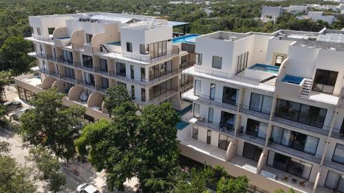 2BR with Fast WiFi FREE BIKES, Rooftop, Pool, and Gym, Тулум (фото 6)