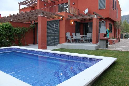 4 bedrooms villa with sea view private pool and enclosed garden at Mont roig del Camp 5 km away from the beach