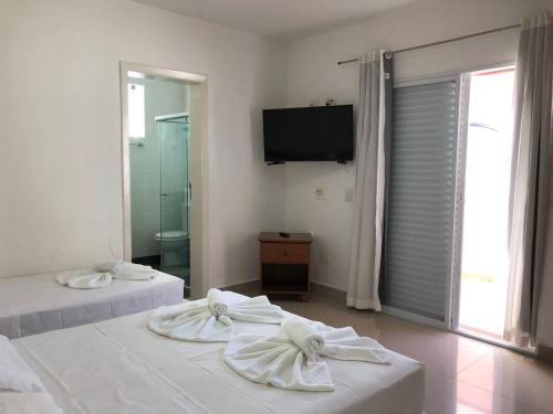 Triple Room with Balcony room in HOTEL ENSEADA BEIRA MAR