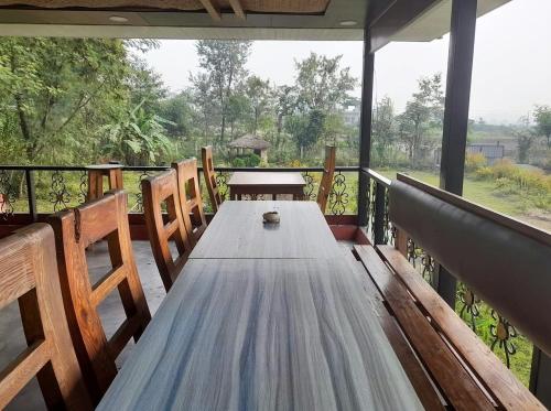 Restaurant, The Glasshouse Hotel in Kawasoti