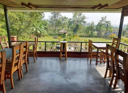 Restaurant, The Glasshouse Hotel in Kawasoti