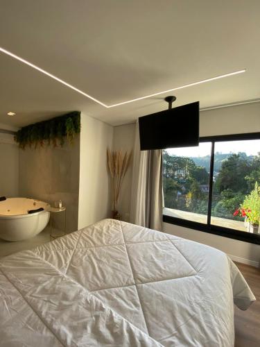 Lindo Apartamento com banheira e linda vista a 500 m do Capivari