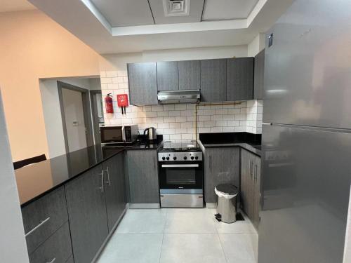Kitchen, Penrose Place Dubai JVC in Jumeirah Village Circle