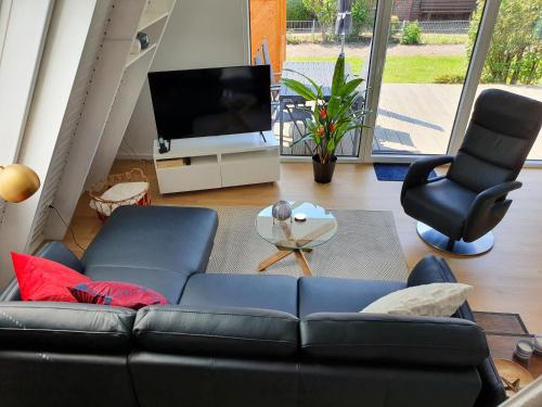 Murmel 5 - E-Ladestation, Wallbox, WLan, Kamin, 2 Fahrräder (Murmel 5 - E-Ladestation, Wallbox, WLan, Kamin, 2 Fahrrader) in Carolinensiel