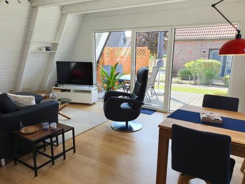 Murmel 5 - E-Ladestation, Wallbox, WLan, Kamin, 2 Fahrräder (Murmel 5 - E-Ladestation, Wallbox, WLan, Kamin, 2 Fahrrader) in Carolinensiel