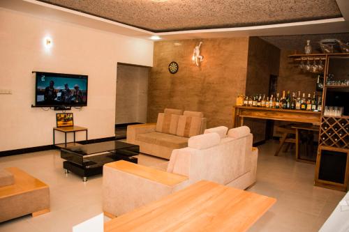 Shared lounge/TV area, NYUMBANI DAILY RENTAL in Singida