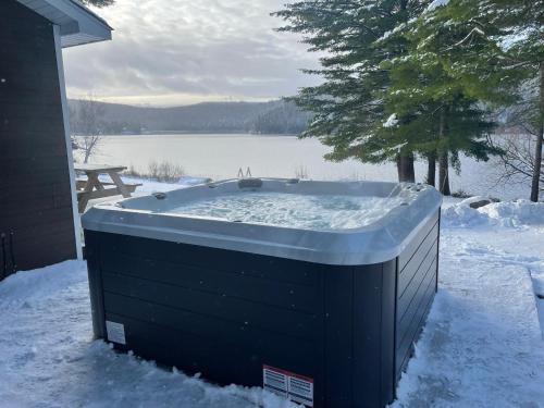 . Chalet le Huard directement au bord du lac