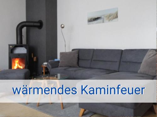 Böltser Hus Ferienwohnungen mit Strandkorb und Kamin 10 Gehminuten zum kurtaxefreien Sandstrand in Neukirchen, Deutschland