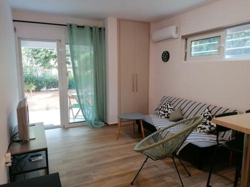 Cosy and Relax Studio by the sea, with garden - Apartment - Saronida