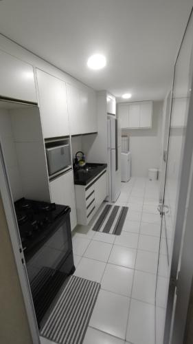 Kitchen, Apartamento Guaruja enseada in Tortuga