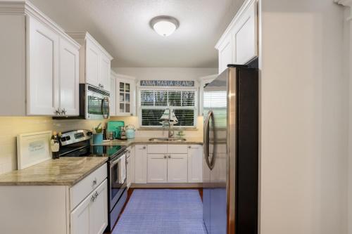 Bean Point Beach Cottage: North End Pool Home Close to Beach & Bay by Anna Maria Life - image 3