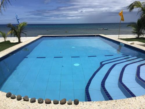 BambooBeachVilla1 AC New OCEANFRONT POOL sunsetview garden kitchen SATELLITE STARLINK WI-FI in ディミアオ