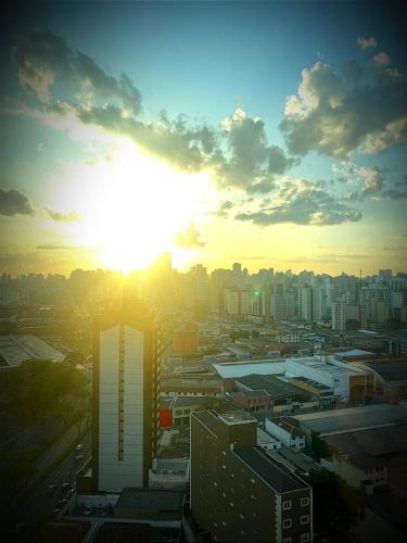 Flat com a vista do por do sol.