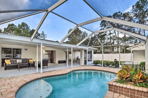 Palm Coast Retreat with Lanai Less Than 8 Mi to Beach!