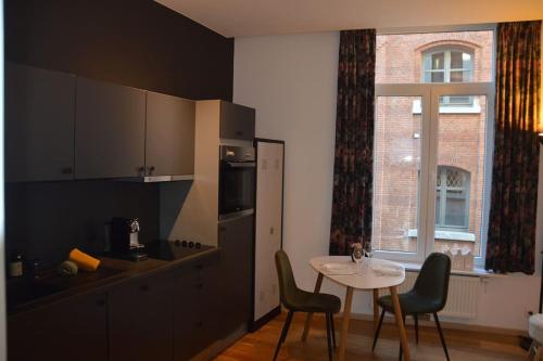Hippe studio in historisch gebouw in oude centrum, Amberes (foto 5)