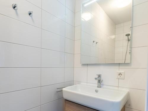 Bathroom, Modern vacation home by the sea with covered terrace and sauna in Tholen