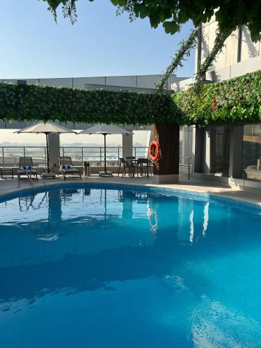 Schwimmbad, Gloria Hotel & Suites in Doha