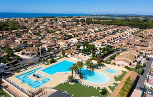 Domaine de vacances à 600m de la plage animations piscines en supplément belle villa climatisée 3 chambres 6 couchages WIFI LRPDSK3