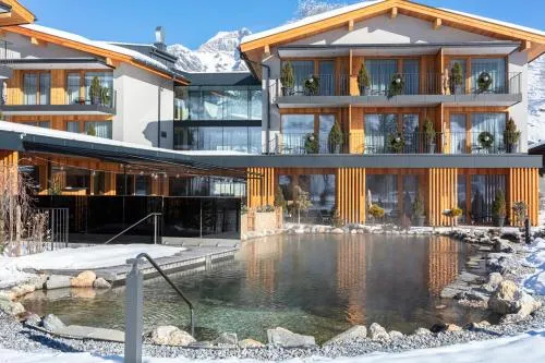 Wellness und Brunch Hotel MorgenZeit beheizter Naturteich Genuss Frühstück bis 13 Uhr Hochkönig Sommercard in Maria Alm am Steinernen Meer, Österreich