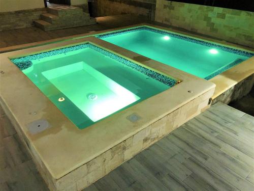 Pezsgőfürdő, Villa Mi Patio By Hospedify - Hermosa villa con mesa de billar y rio cristalino a 3 min Un pequeno p in Jarabacoa