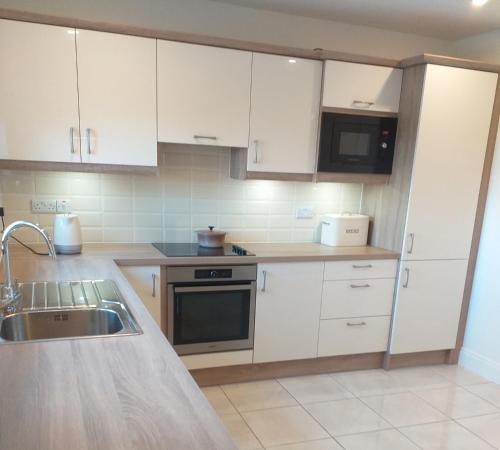 ห้องครัว, Behy Lodge Glenbeigh by Trident Holiday Homes in เกลนเบล