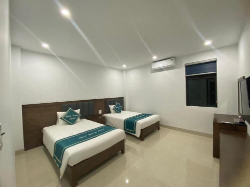 Double or Twin Room with Private Bathroom room in Minh Hưng Motel