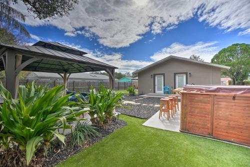 Beachy Palm Harbor Escape with Swim Spa Pool and Gazebo - main image