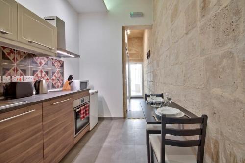 Old Lodge One Bedroom Apartment by Vallettastay, Valletta (fotografie 8)