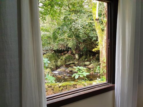 Chalé da cachoeira - Ilhabela (Chale da cachoeira - Ilhabela) in โกกายา