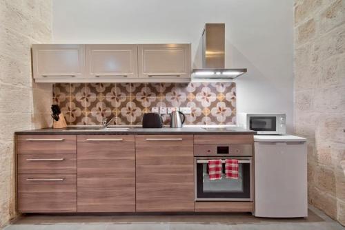Old Lodge Apartment 2 by Vallettastay, La Valletta (foto 6)